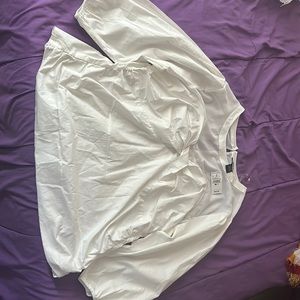 A white blouse from Ashley Stewart, in the size 16